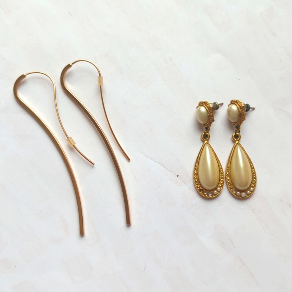 Two pairs of earrings.